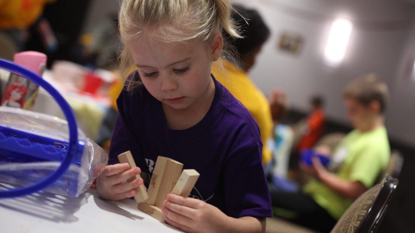 Young girl playing with blocks