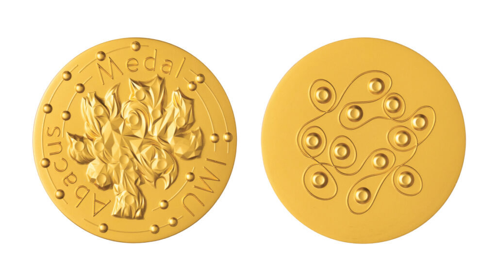 Two gold medals, one side with Abacus Medal IMC and a cluster of geometric crystal shapes, the other side with a pattern of connected dots and raised circles.