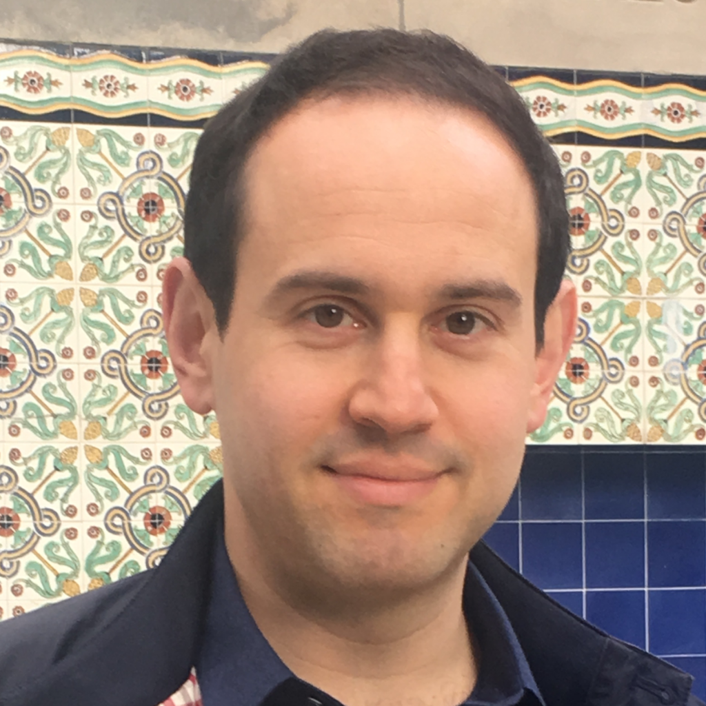 Headshot of SFARI Investigator Evan Feinberg.