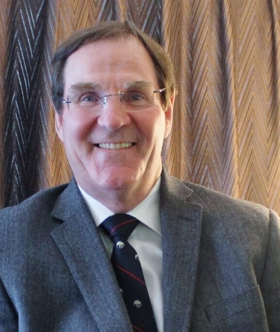 Headshot of SFARI Investigator Alan Evans.