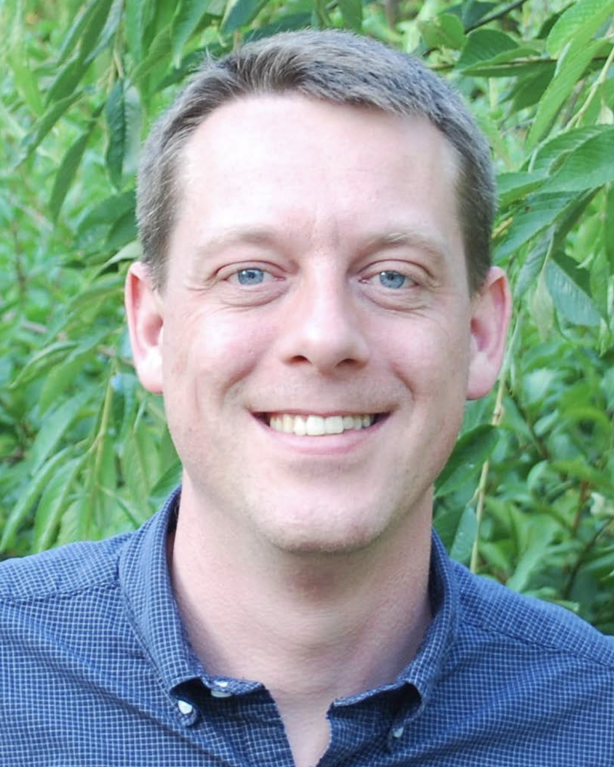Headshot of Investigator Larry Zweifel.