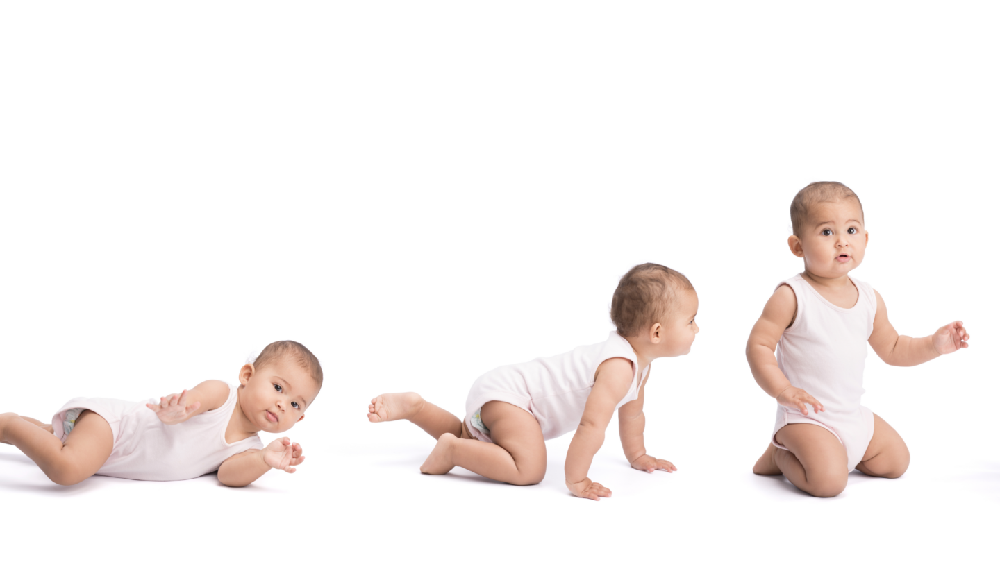 Six babies in white onesies demonstrate stages of movement, from lying on their backs to crawling, kneeling, and finally standing, against a white background.