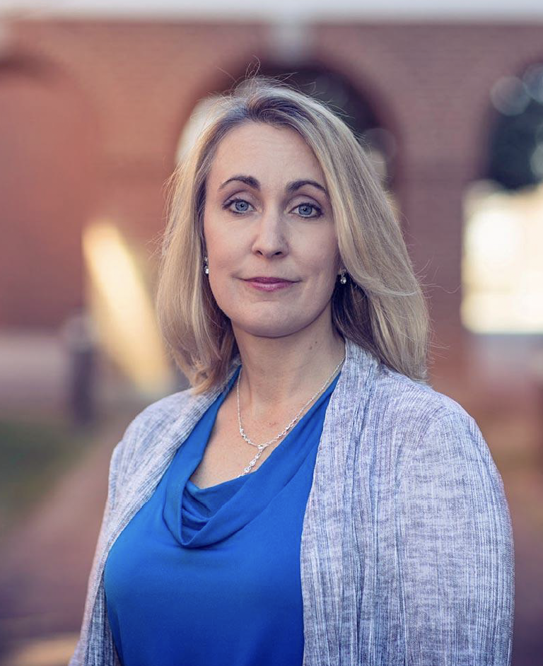 Headshot of Investigator Micah Mazurek.