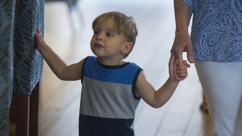 Image of toddler walking cropped