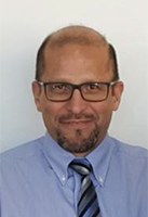 Headshot of SFARI Investigator Cesar Ochoa-Lubinoff.