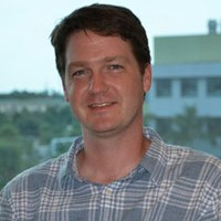 Headshot of SFARI Investigator Damon Page.
