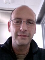 Headshot of SFARI Investigator Elior Peles.