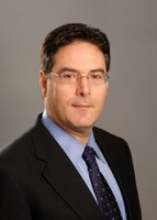 Headshot of SFARI Investigator Eric Hollander.