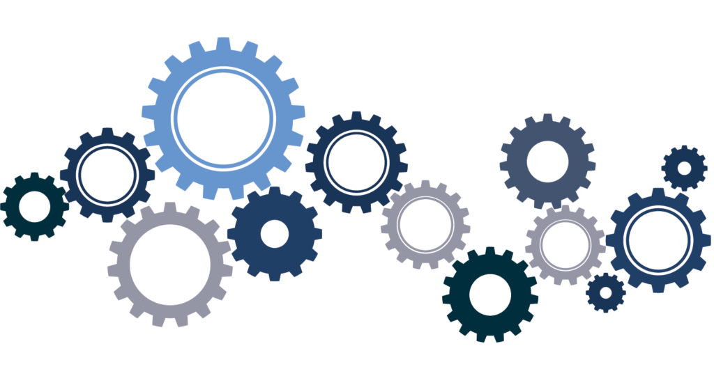 Several interlocking gears of varying sizes and shades of blue, gray, and black are arranged on a white background, suggesting teamwork, engineering, or mechanical processes.