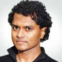 Headshot of Investigator Partha Mitra.