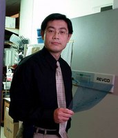 Headshot of Investigator Peng Jin.