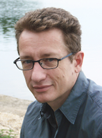 Headshot of Investigator Pavel Osten.