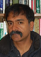 Headshot of Investigator Mani Ramaswami.