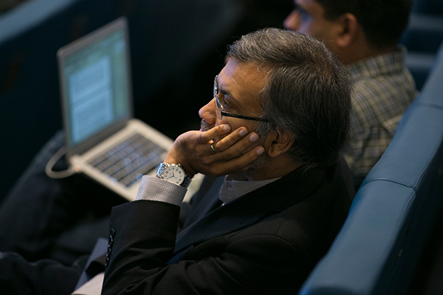 Kannan Soundararajan sitting in a chair while leaning on his left hand
