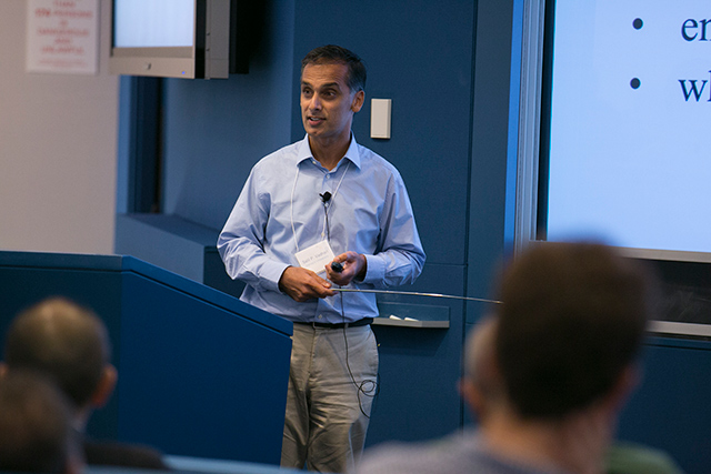 Salil Vadhan standing behind a lectern