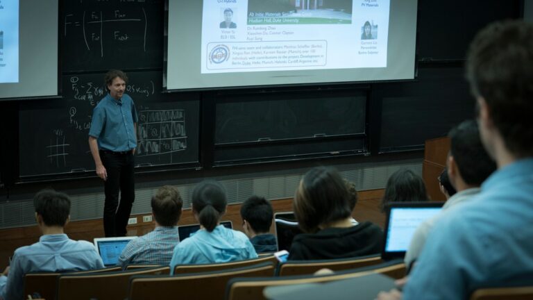 Man standing in front of a slideshow