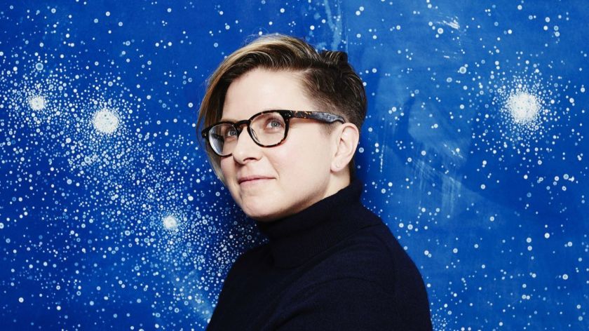Lia Halloran in front of starry background
