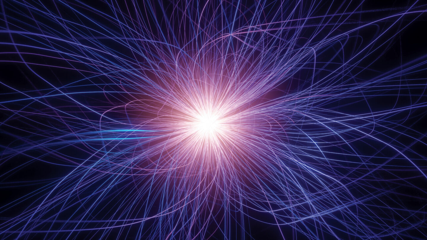 Circular scientific visualization on a black background, resembling an eye or burst pattern. Thousands of thin blue, cyan, and occasional red lines radiate outward from a large black octagonal center, filling a polygonal boundary. The dense network of colored tracks creates a spoked, halo-like structure with intricate overlapping paths and points, suggestive of particle trajectories or complex data flowing outward from a central region.