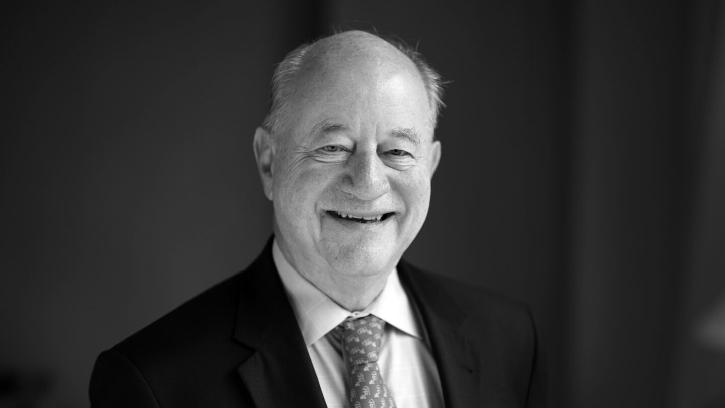 A professional portrait of Gerald D. Fischbach.