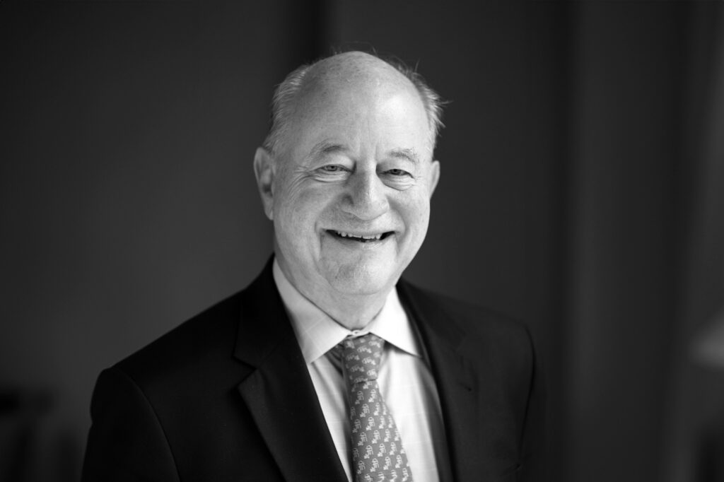 A professional portrait of Gerald D. Fischbach.