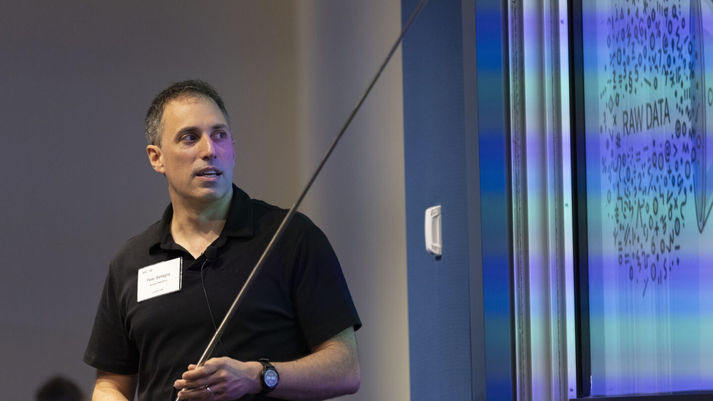 Photo of Peter Battaglia giving his presentation.